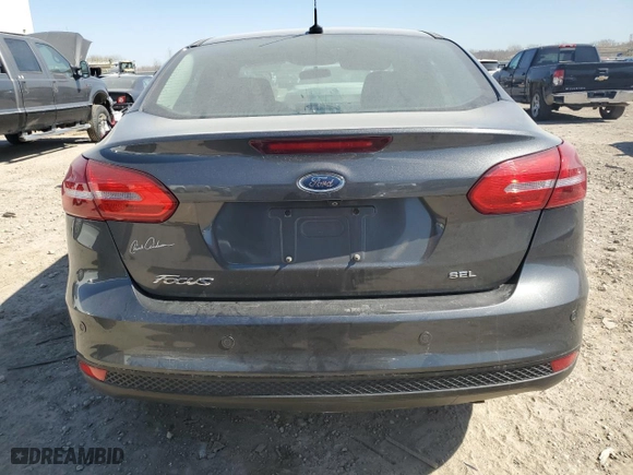 2017 Ford Focus SEL with VIN 1FADP3H21HL254417, listed as a Copart auction lot 48694255 with 110,985 mi miles and Salvage Title. Bid and sale history available at carsss.com. Image 6.