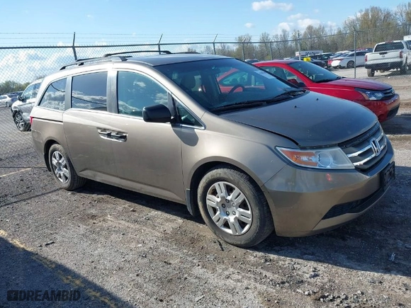 2012 Honda Odyssey LX with VIN 5FNRL5H29CB091860, listed as a IAAI auction lot 42000688 with 295,551 mi miles. Bid and sale history available at carsss.com. Image 1.