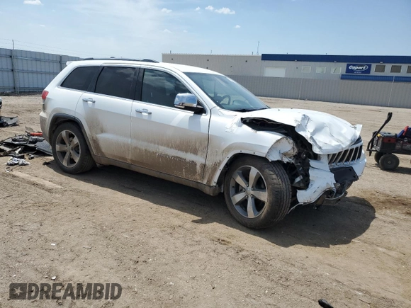 2014 Jeep Grand Cherokee Limited with VIN 1C4RJFBG7EC585151, listed as a Copart auction lot 60458005 with 69,893 mi miles and Salvage title. Bid and sale history available at DreamBid. Image 4.