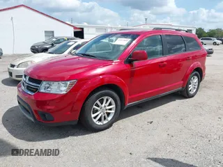 2015 Dodge Journey SXT with VIN 3C4PDCBB2FT560777, listed as a IAAI auction lot 42017660 with 132,628 mi miles and . Bid and sale history available at DreamBid. Image 2.