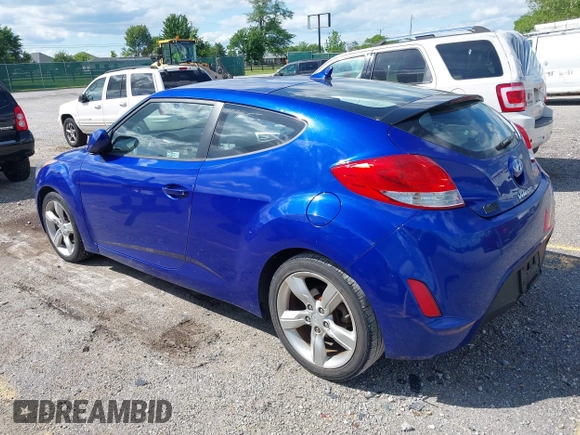 2012 Hyundai Veloster w/Gray Int z VIN KMHTC6AD3CU074501, wystawiony jako IAAI lot #42289456 z przebiegiem 94 303 mil mil oraz . Historia ofert i sprzedaży dostępna na DreamBid. Obrazek 3.