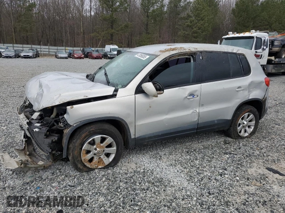 2010 Volkswagen Tiguan S with VIN WVGAV7AX6AW520952, listed as a Copart auction lot 47856855 with 119,822 mi miles and Salvage title. Bid and sale history available at DreamBid. Image 1.