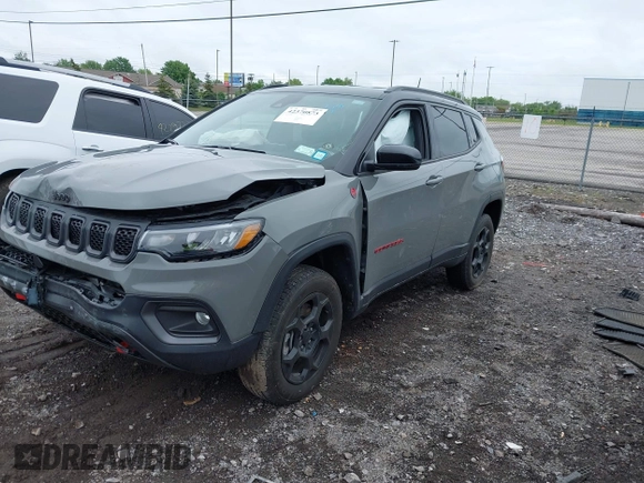 2023 Jeep Compass Trailhawk with VIN 3C4NJDDNXPT562694, listed as a IAAI auction lot 42370873 with 21,988 mi miles and . Bid and sale history available at DreamBid. Image 2.