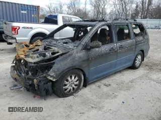 2009 Honda Odyssey EX-L with VIN 5FNRL38699B021100, listed as a Copart auction lot 52871295 with Not Provided miles and Non Repairable. Bid and sale history available at carsss.com. Image 1.
