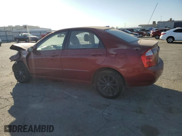 2005 Kia Spectra LX with VIN KNAFE122855108907, listed as a Copart auction lot 77502354 with Not Provided miles and Salvage Title. Bid and sale history available at carsss.com. Image 2.