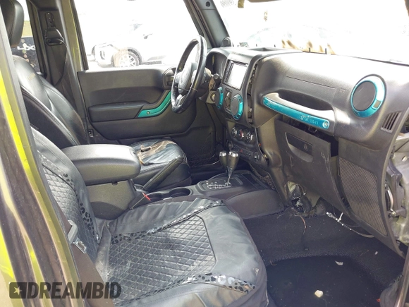 2014 Jeep Wrangler Unlimited Sahara with VIN 1C4BJWEG8EL285843, listed as a IAAI auction lot 42399090 with Not provided miles and . Bid and sale history available at DreamBid. Image 5.