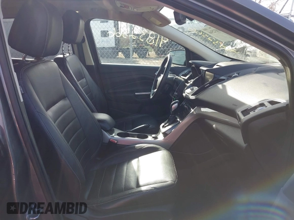 2013 Ford Escape SEL with VIN 1FMCU9H92DUA24934, listed as a IAAI auction lot 41832566 with 124,705 mi miles. Bid and sale history available at carsss.com. Image 5.