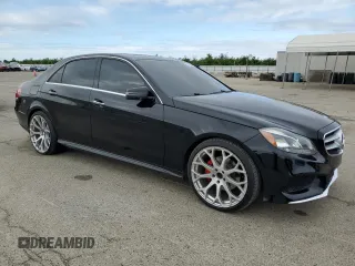 2015 Mercedes-Benz E 350 Sport with VIN WDDHF5KB5FB083344, listed as a Copart auction lot 51479885 with 159,283 mi miles and Salvage title. Bid and sale history available at DreamBid. Image 4.