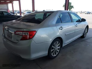 2014 Toyota Camry Hybrid LE with VIN 4T1BD1FK6EU128766, listed as a IAAI auction lot 42004487 with 280,013 mi miles. Bid and sale history available at carsss.com. Image 4.