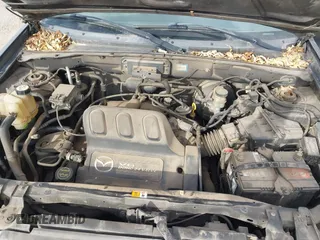 2001 Mazda Tribute LX with VIN 4F2CU08191KM27990, listed as a IAAI auction lot 41487001 with 209,394 mi miles and . Bid and sale history available at carsss.com. Image 10.