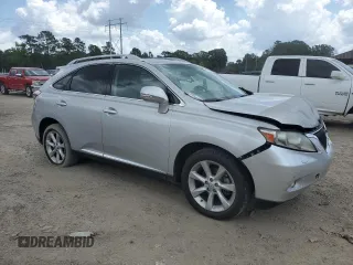 2011 Lexus RX 350 with VIN JTJZK1BA9B2004470, listed as a Copart auction lot 59735525 with 128,501 mi miles and Salvage title. Bid and sale history available at DreamBid. Image 4.