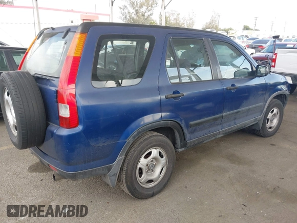 2004 Honda CR-V LX with VIN JHLRD684X4C023539, listed as a IAAI auction lot 42032809 with 186,056 mi miles and . Bid and sale history available at carsss.com. Image 4.
