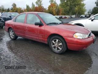 2000 Ford Contour SE Fleet z VIN 1FAFP6636YK142708, wystawiony jako Copart lot #77976124 z przebiegiem 126 879 mil mil oraz Szkody całkowita. Historia ofert i sprzedaży dostępna na DreamBid. Obrazek 4.