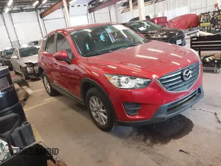 2016 Mazda CX-5 Sport z VIN JM3KE2BY3G0684861, wystawiony jako IAAI lot #42050897 z przebiegiem 165 688 mil mil oraz . Historia ofert i sprzedaży dostępna na DreamBid. Obrazek 1.