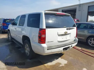 2010 Chevrolet Tahoe LS with VIN 1GNMCAE3XAR215407, listed as a IAAI auction lot 42185643 with 201,070 mi miles and . Bid and sale history available at DreamBid. Image 3.