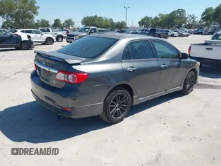 2011 Toyota Corolla L with VIN 2T1BU4EE8BC667772, listed as a IAAI auction lot 41960526 with 219,911 mi miles. Bid and sale history available at carsss.com. Image 4.