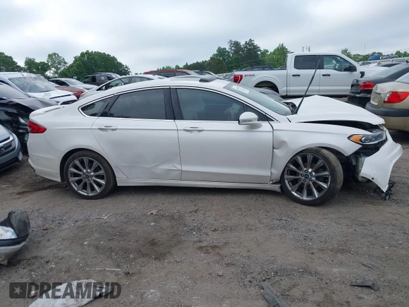 2017 Ford Fusion Titanium with VIN 3FA6P0K96HR105127, listed as a IAAI auction lot 39351701 with 103,295 mi miles. Bid and sale history available at carsss.com. Image 14.
