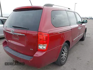 2012 Kia Sedona EX with VIN KNDMH4C76C6463143, listed as a IAAI auction lot 41990970 with 214,045 mi miles. Bid and sale history available at carsss.com. Image 4.