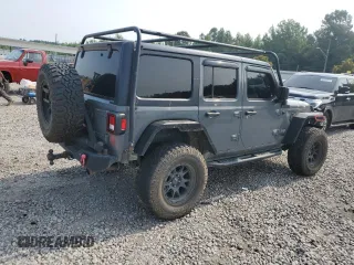 2018 Jeep Wrangler Unlimited Sport S with VIN 1C4HJXDG0JW281103, listed as a Copart auction lot 60400565 with 112,485 mi miles and Salvage title. Bid and sale history available at DreamBid. Image 3.