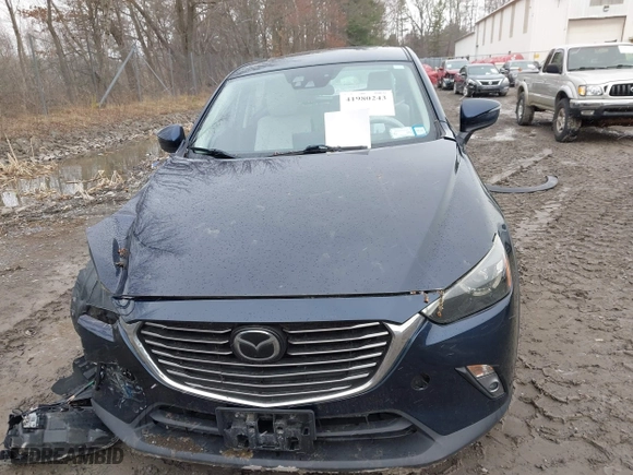 2017 Mazda CX-3 Grand Touring with VIN JM1DKFD75H0179167, listed as a IAAI auction lot 41980243 with 69,076 mi miles. Bid and sale history available at carsss.com. Image 12.