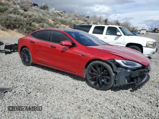 2016 Tesla Model S 90D with VIN 5YJSA1E43GF141843, listed as a Copart auction lot 51788965 with 59,744 mi miles and Salvage Title. Bid and sale history available at DreamBid. Image 4.