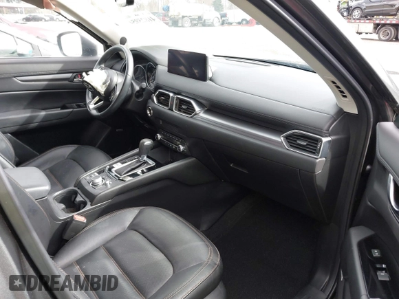 2021 Mazda CX-5 Touring with VIN JM3KFBCM2M0484011, listed as a IAAI auction lot 41825954 with 48,958 mi miles. Bid and sale history available at carsss.com. Image 5.