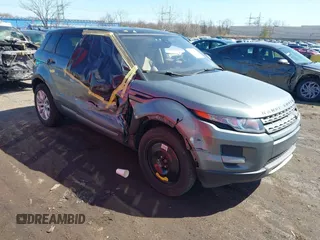 2015 Land Rover Range Rover Evoque Pure z VIN SALVN2BG3FH070785, wystawiony jako IAAI lot #41833448 z przebiegiem 61 961 mil mil oraz . Historia ofert i sprzedaży dostępna na DreamBid. Obrazek 1.