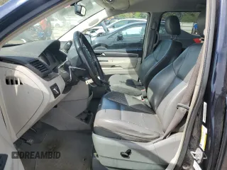2010 Volkswagen Routan SE z VIN 2V4RW3D13AR209336, wystawiony jako Copart lot #56141365 z przebiegiem 169 541 mil mil oraz Szkody całkowita. Historia ofert i sprzedaży dostępna na DreamBid. Obrazek 7.