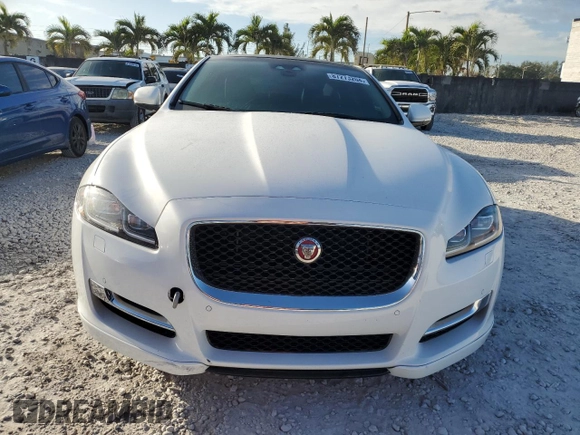 2018 Jaguar XJ with VIN SAJWA1C77J8W14750, listed as a Copart auction lot 87273204 with 51,040 mi miles and Clean Title. Bid and sale history available at carsss.com. Image 5.
