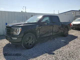 2021 Ford F-150 XL with VIN 1FTFW1E81MFA80456, listed as a Copart auction lot 61268545 with 57,233 mi miles and Salvage title. Bid and sale history available at DreamBid. Image 1.