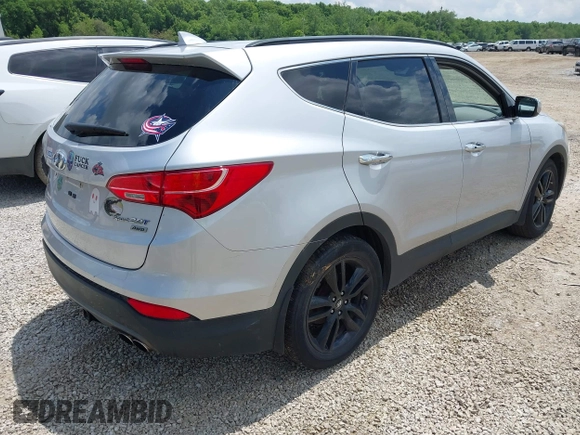 2013 Hyundai Santa Fe Sport z VIN 5XYZUDLA8DG055576, wystawiony jako IAAI lot #42392636 z przebiegiem 165 096 mil mil oraz . Historia ofert i sprzedaży dostępna na DreamBid. Obrazek 4.