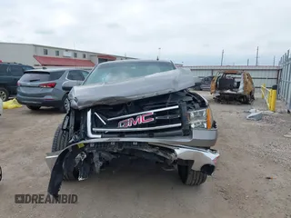 2013 GMC Sierra 1500 SLE z VIN 3GTP1VE09DG302860, wystawiony jako IAAI lot #42031246 z przebiegiem Nie podano mil oraz . Historia ofert i sprzedaży dostępna na DreamBid. Obrazek 13.