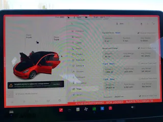 2021 Tesla Model 3 Standard Range Plus with VIN 5YJ3E1EA0MF099562, listed as a IAAI auction lot 41771323 with 26,087 mi miles. Bid and sale history available at carsss.com. Image 19.