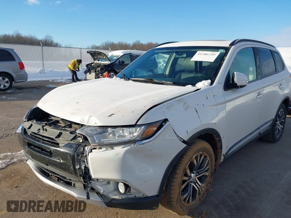 2016 Mitsubishi Outlander SE with VIN JA4AD3A32GZ001878, listed as a IAAI auction lot 41286349 with 153,225 mi miles and . Bid and sale history available at DreamBid. Image 6.