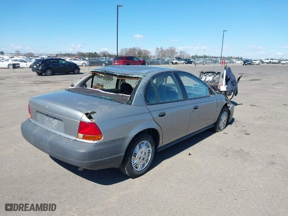 1999 Saturn SL with VIN 1G8ZH5282XZ169243, listed as a IAAI auction lot 41859519 with 224,157 mi miles. Bid and sale history available at carsss.com. Image 4.
