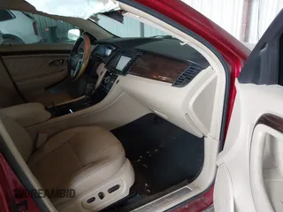 2013 Ford Taurus Limited с VIN 1FAHP2F92DG233722, выставлен на аукционе IAAI как лот 41145252 с пробегом 166 632 миль миль и . История ставок и продаж доступна на DreamBid. Изображение 5.