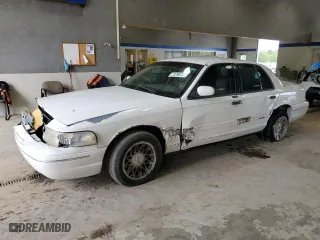 2003 Ford Crown Victoria LX with VIN 2FAFP74W23X134274, listed as a Copart auction lot 73295754 with 212,581 mi miles and Salvage Title. Bid and sale history available at carsss.com. Image 1.