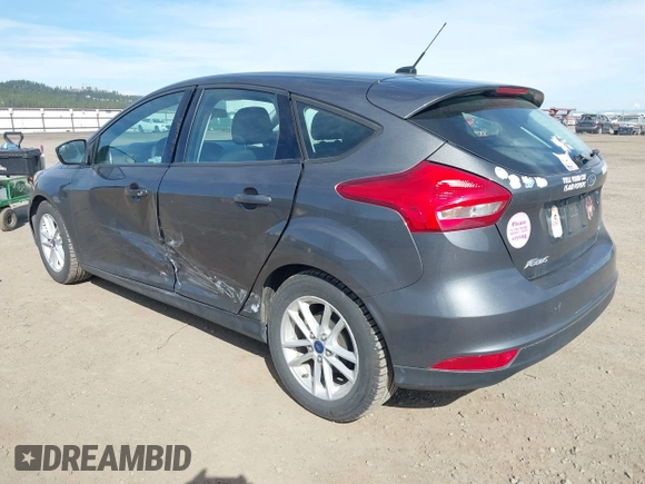 2015 Ford Focus SE with VIN 1FADP3K2XFL306858, listed as a IAAI auction lot 41895767 with 79,566 mi miles. Bid and sale history available at carsss.com. Image 3.