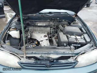 1996 Toyota Camry DX with VIN JT2BG12K5T0346311, listed as a IAAI auction lot 42130482 with 214,872 mi miles. Bid and sale history available at carsss.com. Image 10.