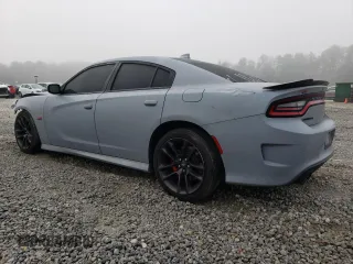 2021 Dodge Charger Scat Pack Widebody with VIN 2C3CDXGJ2MH519405, listed as a Copart auction lot 48917875 with 69,436 mi miles and Salvage Title. Bid and sale history available at carsss.com. Image 2.