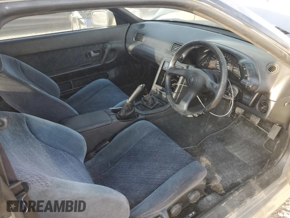 1992 Nissan Skyline z VIN HNR32035831, wystawiony jako Copart lot #74228974 z przebiegiem 49 082 mil mil oraz Szkoda całkowita • Salvage title. Historia ofert i sprzedaży dostępna na DreamBid. Obrazek 8.