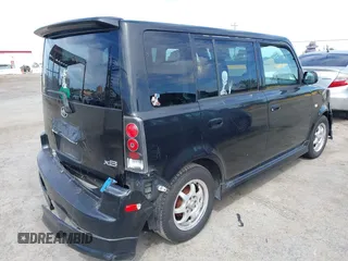 2004 Scion xB with VIN JTLKT324640138587, listed as a IAAI auction lot 42030242 with 199,289 mi miles. Bid and sale history available at carsss.com. Image 4.