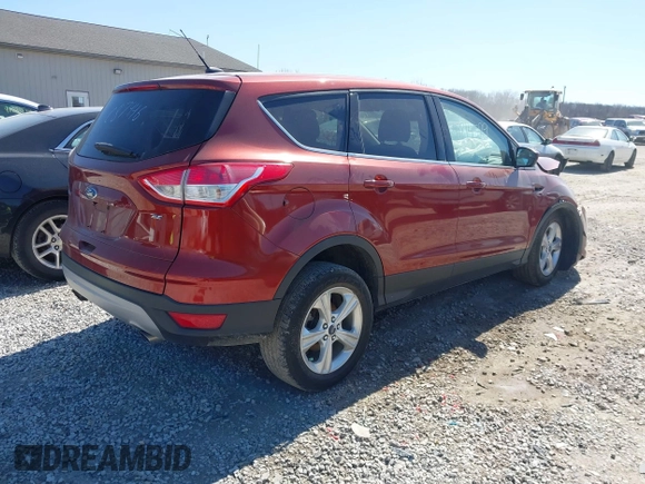 2015 Ford Escape SE with VIN 1FMCU0G71FUC87446, listed as a IAAI auction lot 41814589 with 137,051 mi miles. Bid and sale history available at carsss.com. Image 4.