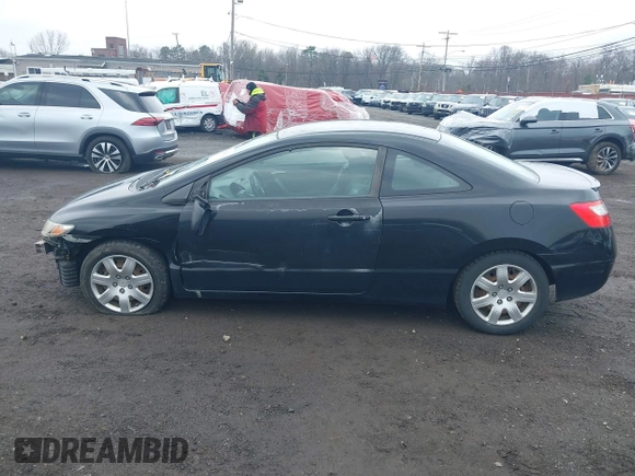 2010 Honda Civic Cpe LX with VIN 2HGFG1B65AH506256, listed as a IAAI auction lot 41942862 with 142,683 mi miles. Bid and sale history available at carsss.com. Image 14.