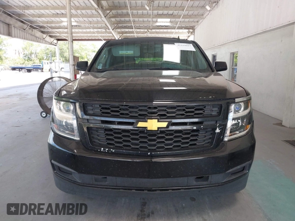 2015 Chevrolet Suburban LT with VIN 1GNSKJKC7FR199544, listed as a IAAI auction lot 42169017 with 219,219 mi miles and . Bid and sale history available at DreamBid. Image 12.