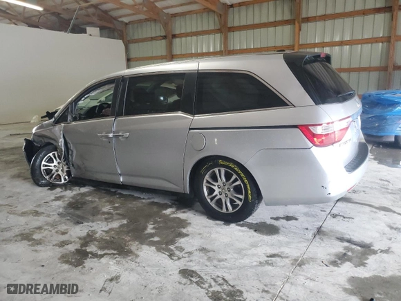 2011 Honda Odyssey EX-L with VIN 5FNRL5H68BB076882, listed as a Copart auction lot 51835945 with 176,431 mi miles and Salvage Title. Bid and sale history available at carsss.com. Image 2.