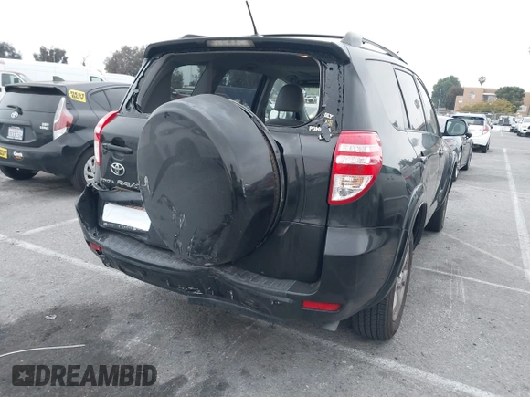2009 Toyota RAV4 Ltd with VIN JTMZK31VX9D001644, listed as a IAAI auction lot 42030571 with 186,844 mi miles. Bid and sale history available at carsss.com. Image 4.