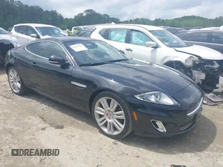 2012 Jaguar XK with VIN SAJWA4FB8CLB47049, listed as a IAAI auction lot 42118136 with 60,953 mi miles. Bid and sale history available at carsss.com. Image 13.