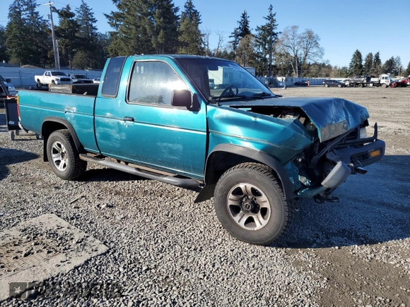 1996 Nissan Frontier XE with VIN 1N6SD16Y9TC338402, listed as a Copart auction lot 45058765 with 164,295 mi miles and Salvage title. Bid and sale history available at DreamBid. Image 4.