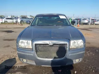 2006 Chrysler 300 Touring with VIN 2C3LA53G66H170047, listed as a IAAI auction lot 42135663 with 215,285 mi miles. Bid and sale history available at carsss.com. Image 6.